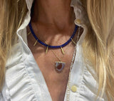 Lapiz and golden bead necklace