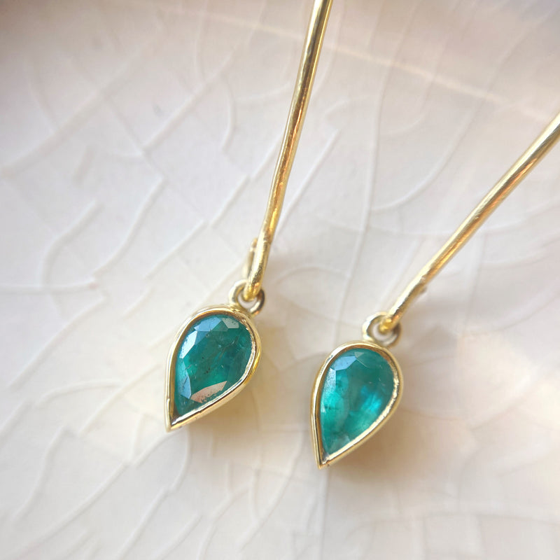 Pear drop emerald earrings